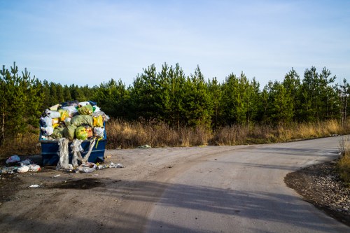 Workers performing house clearance in a modern Edmonton home